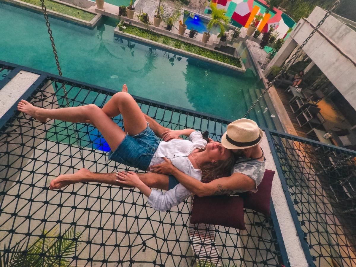 Hotel Makaaba Eco-Boutique باكالار المظهر الخارجي الصورة A couple on a hammock